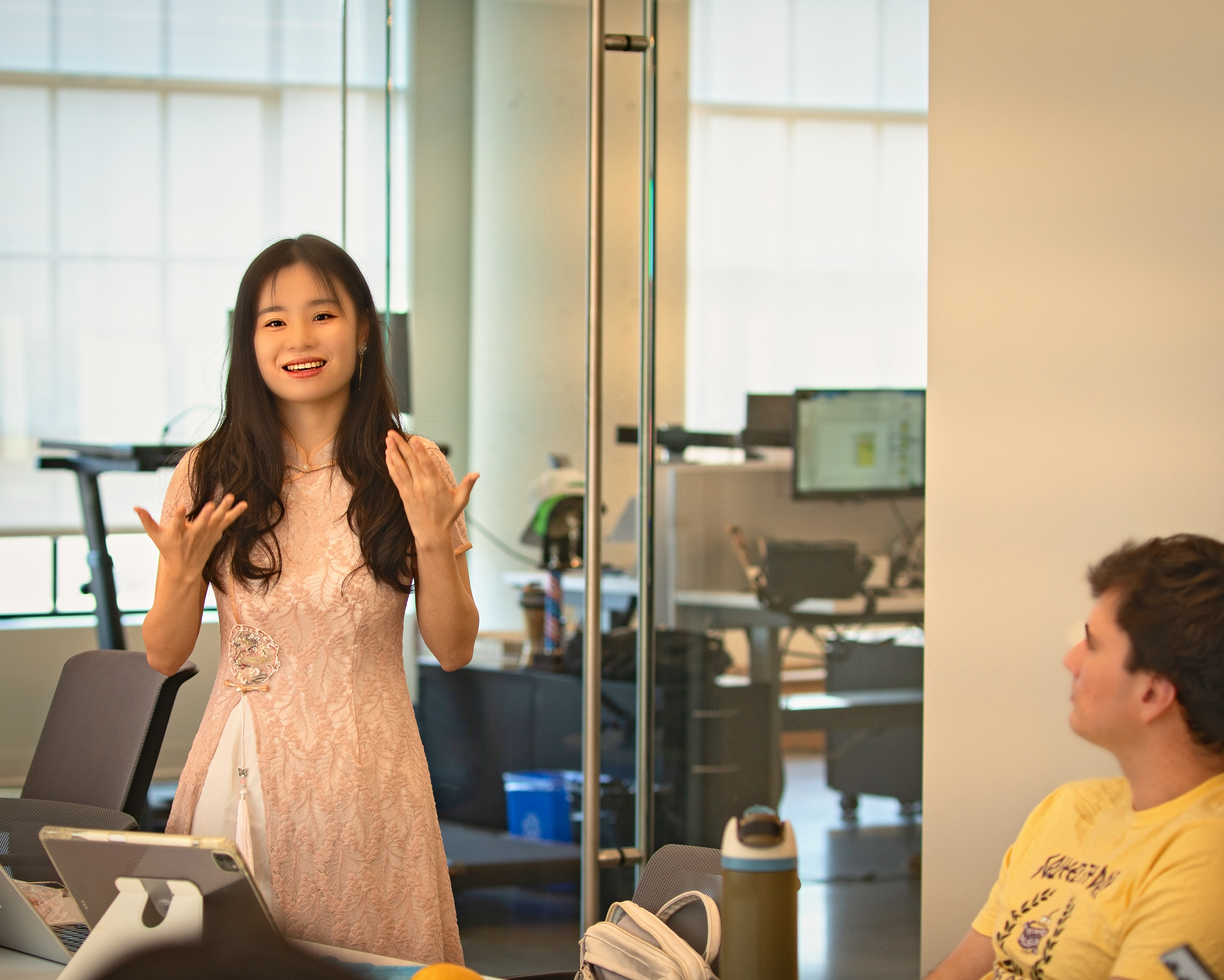 Presenter speaking to an audience at a corporate event — Twin Cities event and senior portrait photography by Loon & Birch Photography