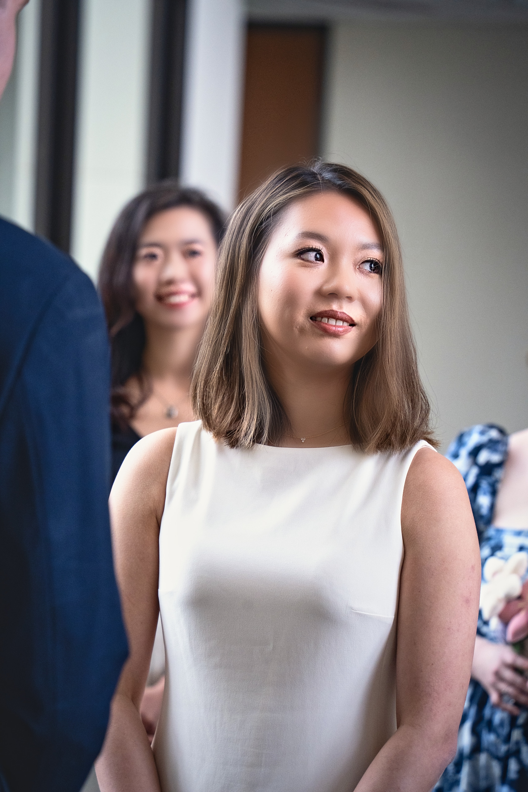 Candid portrait of a smiling bride during her wedding ceremony — Twin Cities wedding photography by Loon & Birch Photography